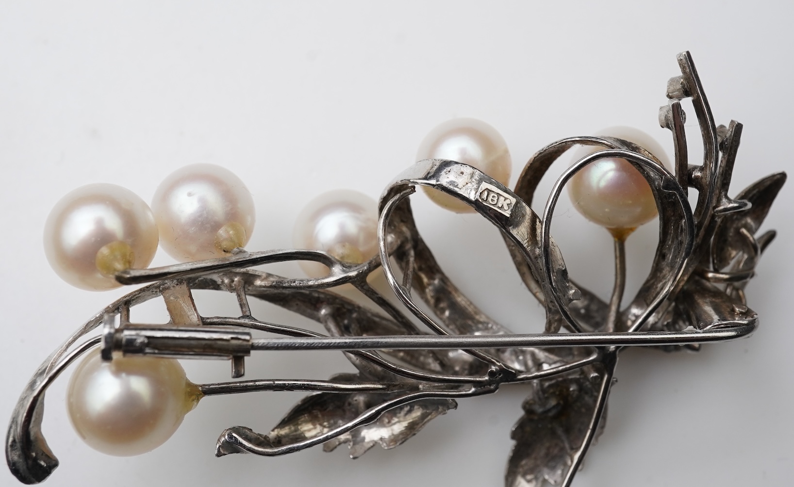 A collection of cultured pearl jewels and a cameo pendant